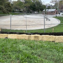 EDD inspecting erosion control measures (silt fence and straw bale dike) during construction of a subsurface green infrastructure practice at a park in Queens.