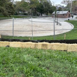 EDD inspecting erosion control measures (silt fence and straw bale dike) during construction of a subsurface green infrastructure practice at a park in Queens.