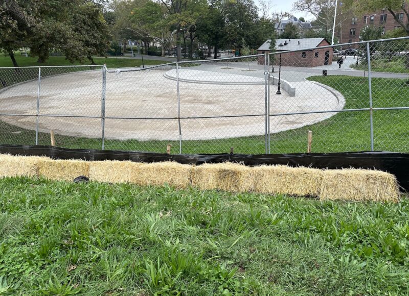 EDD inspecting erosion control measures (silt fence and straw bale dike) during construction of a subsurface green infrastructure practice at a park in Queens.